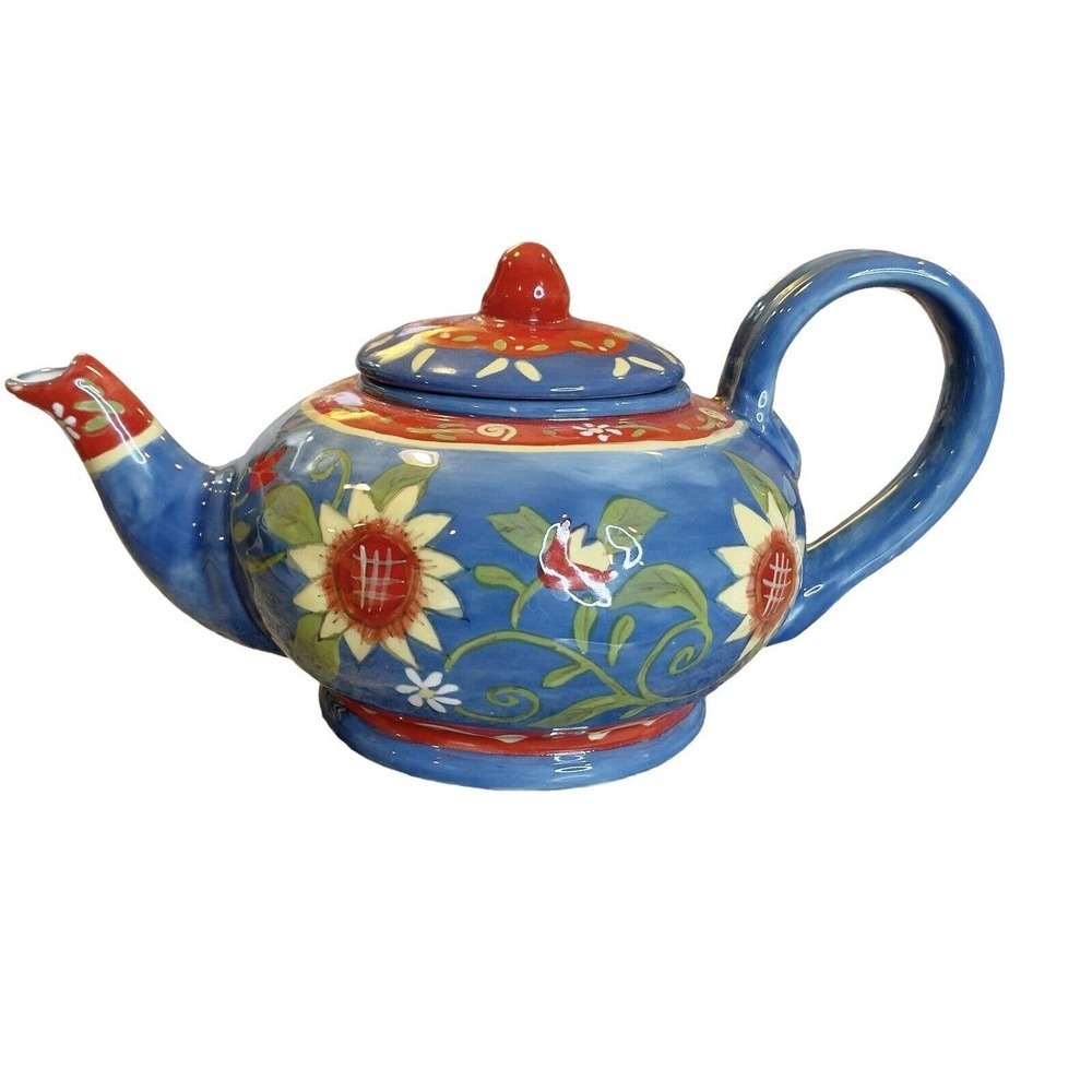 Teapot Blue Background Sunflowers Green Leaves Red Accents 10.5” X 5.5”